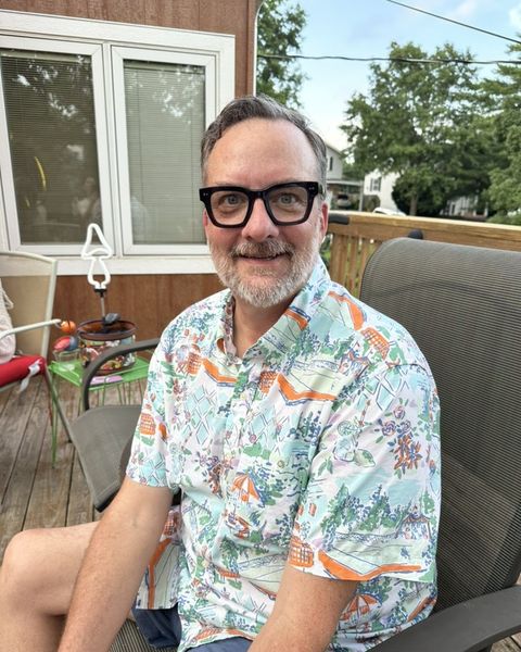 Steve relaxing on a back deck